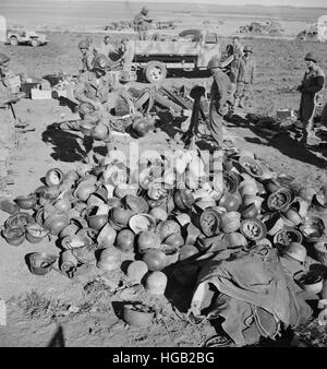 Pile of German helmets left by the Tenth and Fifteenth Panzer Divisions, 1943. Stock Photo