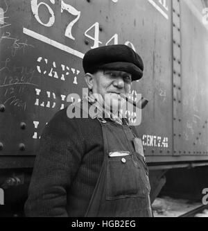 Railroad worker at a Chicago and Northwestern Railroad yard in Illinois, 1942. Stock Photo