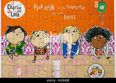 Charlie and Lola pink milk is my favourite and my best 45 piece fun jigsaw puzzle Stock Photo