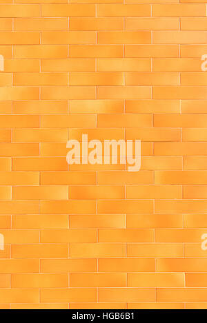 An orange tiled background with relatively small tiles Stock Photo