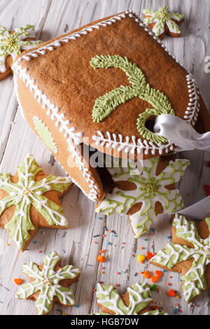 gingerbread snowflake and a bag of cookies close-up on the table. horizontal Stock Photo