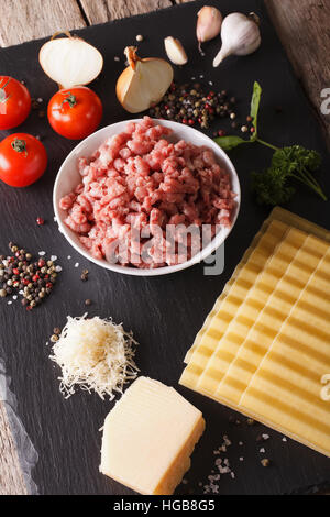 Ingredients for classic Italian lasagna close-up on the table. vertical Stock Photo