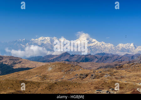 Kanchenjunga, is the third highest mountain in the world, and lies partly in Nepal and partly in Sikkim, India. Stock Photo