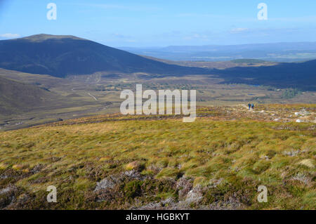 Two Walkers Walking to the Corbett Meall a' Bhuachaille on the Footpath from Braemar via the Lairig an Laoigh to Glenmore Lodge. Stock Photo