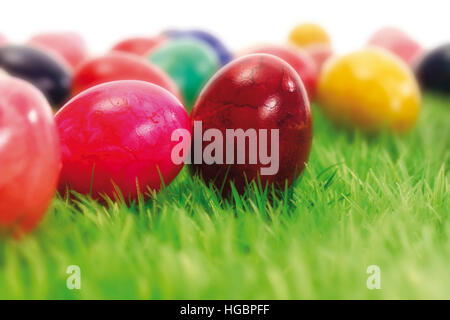 Coloured Easter eggs in the grass Stock Photo