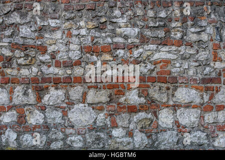 Destroyed over time a fragment of the castle wall Stock Photo
