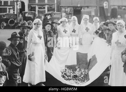 American Red Cross workers during a Red Cross parade. Stock Photo