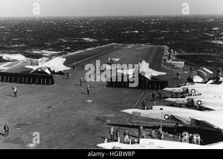 F-4 Phantom II aircraft are readied for launch aboard USS John F. Kennedy. Stock Photo