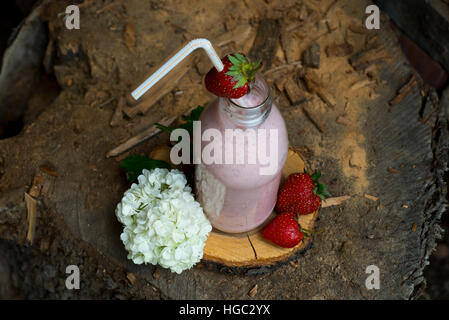 Rustic style strawberry milkshake Stock Photo