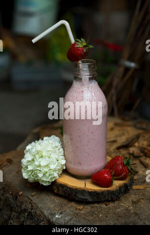 Rustic style strawberry milkshake Stock Photo