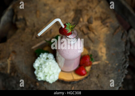 Rustic style strawberry milkshake Stock Photo