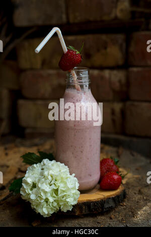 Rustic style strawberry milkshake Stock Photo