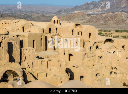 Mud bricked buildings in old, abandoned part of Kharanaq village in Ardakan County, Yazd Province, Iran Stock Photo