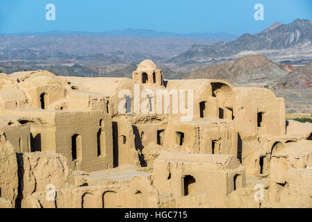 Mud bricked buildings in old, abandoned part of Kharanaq village in Ardakan County, Yazd Province, Iran Stock Photo