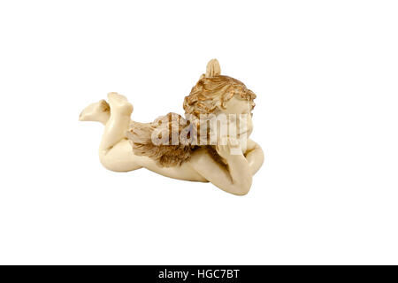 small figurine of lying little angel Stock Photo
