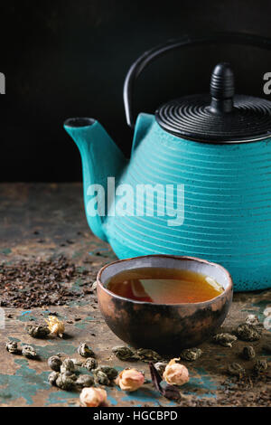 Variety of dry tea with teapot Stock Photo