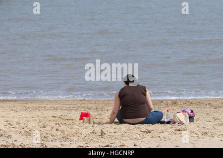 Naked obese woman sitting Stock Photo - Alamy