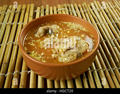 Fish mango curry, Fish cooked in a coconut milk based gravy with mangoes Stock Photo