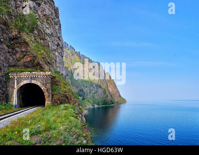 Railway tunnel at edge of land from deepest Lake Baikal. Irkutsk region. Russia Stock Photo