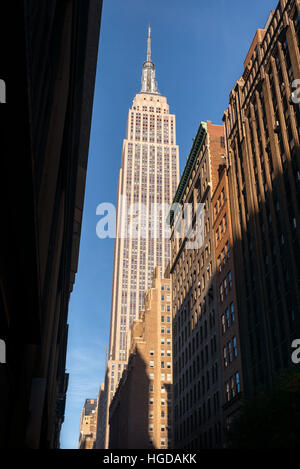 Classic nostalgic view of the Empire State Building from below, New York City Stock Photo