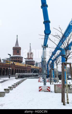 train on Oberbaum bridge (Oberbaumbrücke) in Berlin during winter Stock Photo