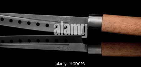 Japanese kitchen knife, yanagi sashimi knife on a black background Stock Photo