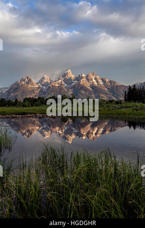 WY01992-00...WYOMING - The Teton Range reflected in the Snake River viewed from Schwabacher Landing in Grand Teton National Park. Stock Photo