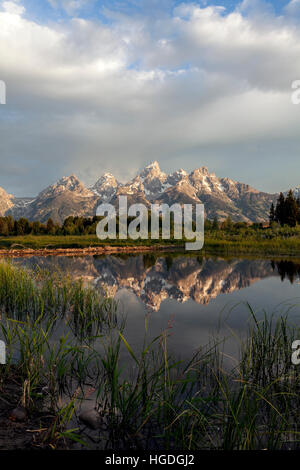 WY01993-00...WYOMING - The Teton Range reflected in the Snake River viewed from Schwabacher Landing in Grand Teton National Park. Stock Photo