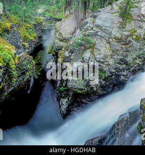 waterfall plunging into a narrow gorge on upper jocko river near arlee, montana Stock Photo