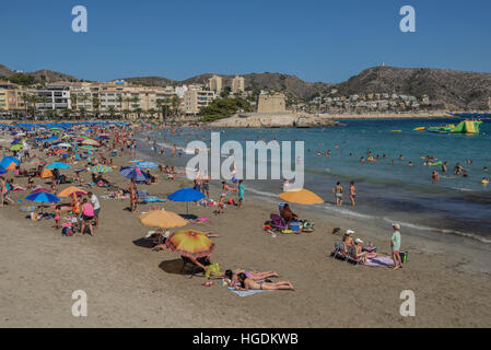Platja de L'Ampolla Beach with fortress, Moraira, Alicante, Costa Blanca, Spain Stock Photo