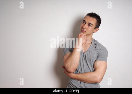 young man contemplating an idea Stock Photo