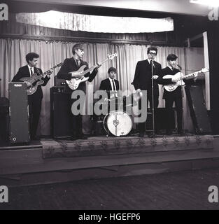 1960s, historical, British youngsters in a skiffle or rockabilly band playing on stage. Stock Photo