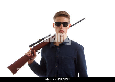 Young man with a rifle Stock Photo