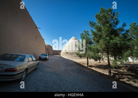 ancient type of evaporative cooler called Yakhchal and old city walls in Kashan city, capital of Kashan County of Iran Stock Photo