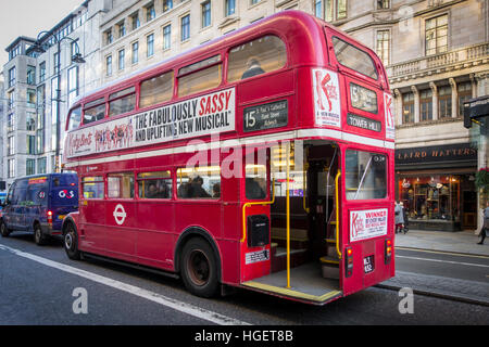 London red routemaster bus in traffic on the Strand Stock Photo