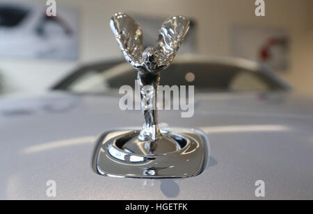 The Spirit of Ecstasy bonnet ornament on a Rolls-Royce car at the company's Berkeley Square showroom in London, as Rolls-Royce Motor Cars has renewed its commitment to Britain after a double-digit jump in UK revenues helped the German-owned company notch up its second highest sales record in over a century. Stock Photo