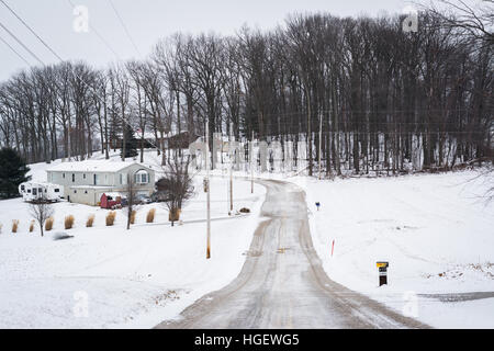 Snow covered fields and road, near Jefferson, Pennsylvania. Stock Photo