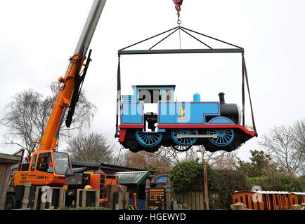 Thomas The Tank Engine is lifted out of Drusillas Park in Alfriston, East Sussex, after years of service as the park develops a new Go Safari experience for later this year. Stock Photo