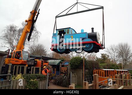 Thomas The Tank Engine is lifted out of Drusillas Park in Alfriston, East Sussex, after years of service as the park develops a new Go Safari experience for later this year. Stock Photo