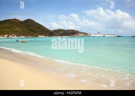 Beautiful Philipsburg beach with golden sand & turquoise water. Cruise ships in the distance, St Maarten, Caribbean. Stock Photo