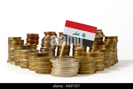 Iraq flag waving with stack of money coins Stock Photo