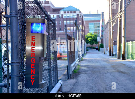 Emergency phone box in Chicago alley near Loyola Campus Stock Photo