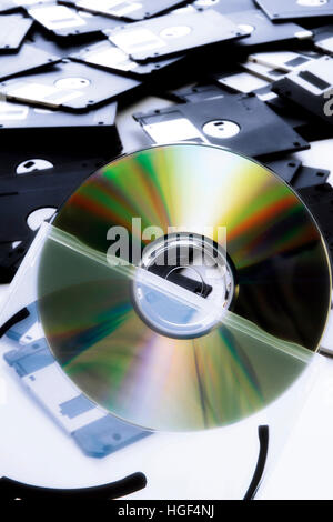 A CD, floppy disk in background Stock Photo