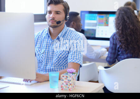 startup business, software developer working on desktop computer Stock Photo