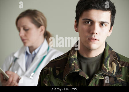 Soldier Being Assessed By Doctor Stock Photo