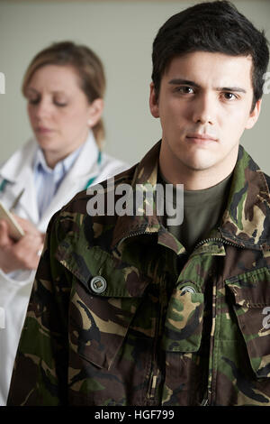 Soldier Being Assessed By Doctor Stock Photo