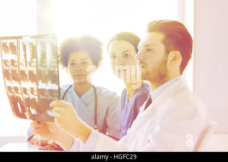 group of doctors looking to x-ray at hospital Stock Photo