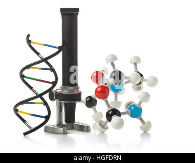 Chemical molecule and DNA structure model with old microscope over white background. Science or research history concept Stock Photo