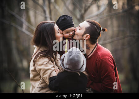 Children Walk In The Autumn Park In The Fall Stock Photo - Alamy