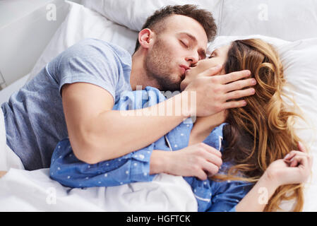Close up of kissing young couple Stock Photo